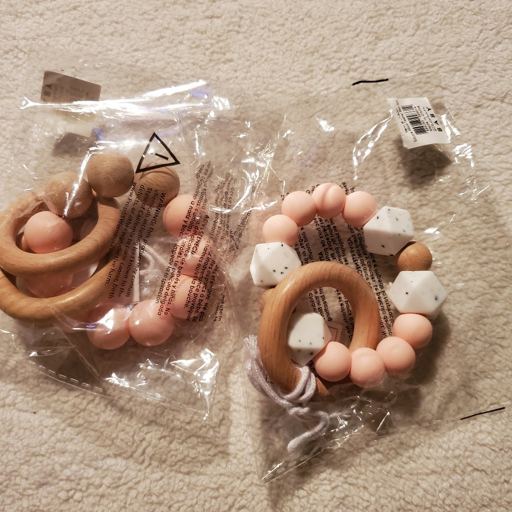 Two Silcone and Wood Teethers